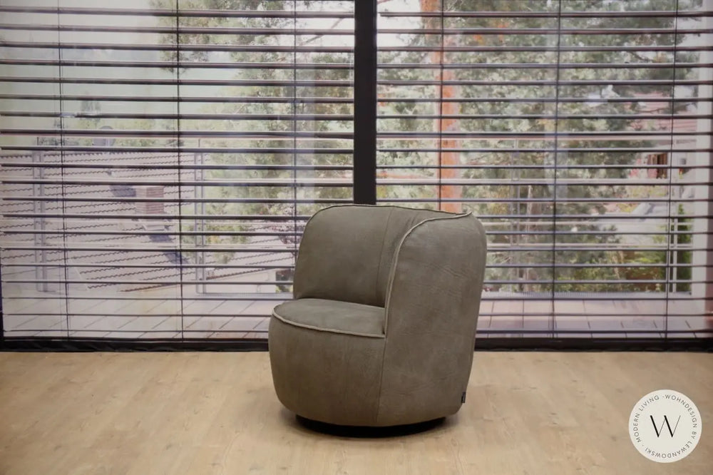 Dreh- und Schaukelsessel Donna mit Hocker in Leder Rhino elefant Bullfrog