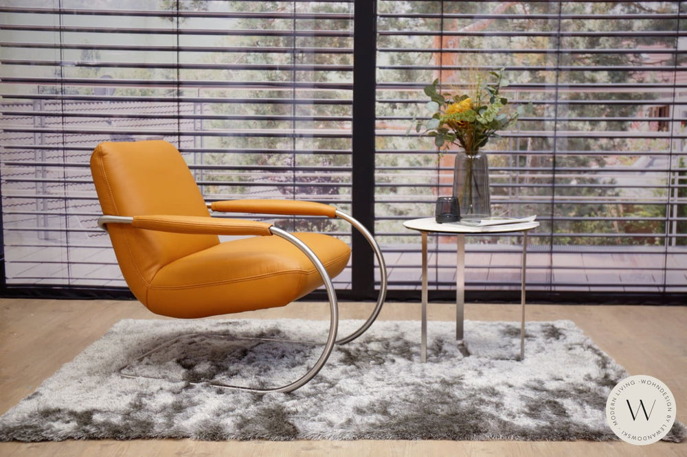 Modell Jingle Sessel in Leder X Happy gold Koinor